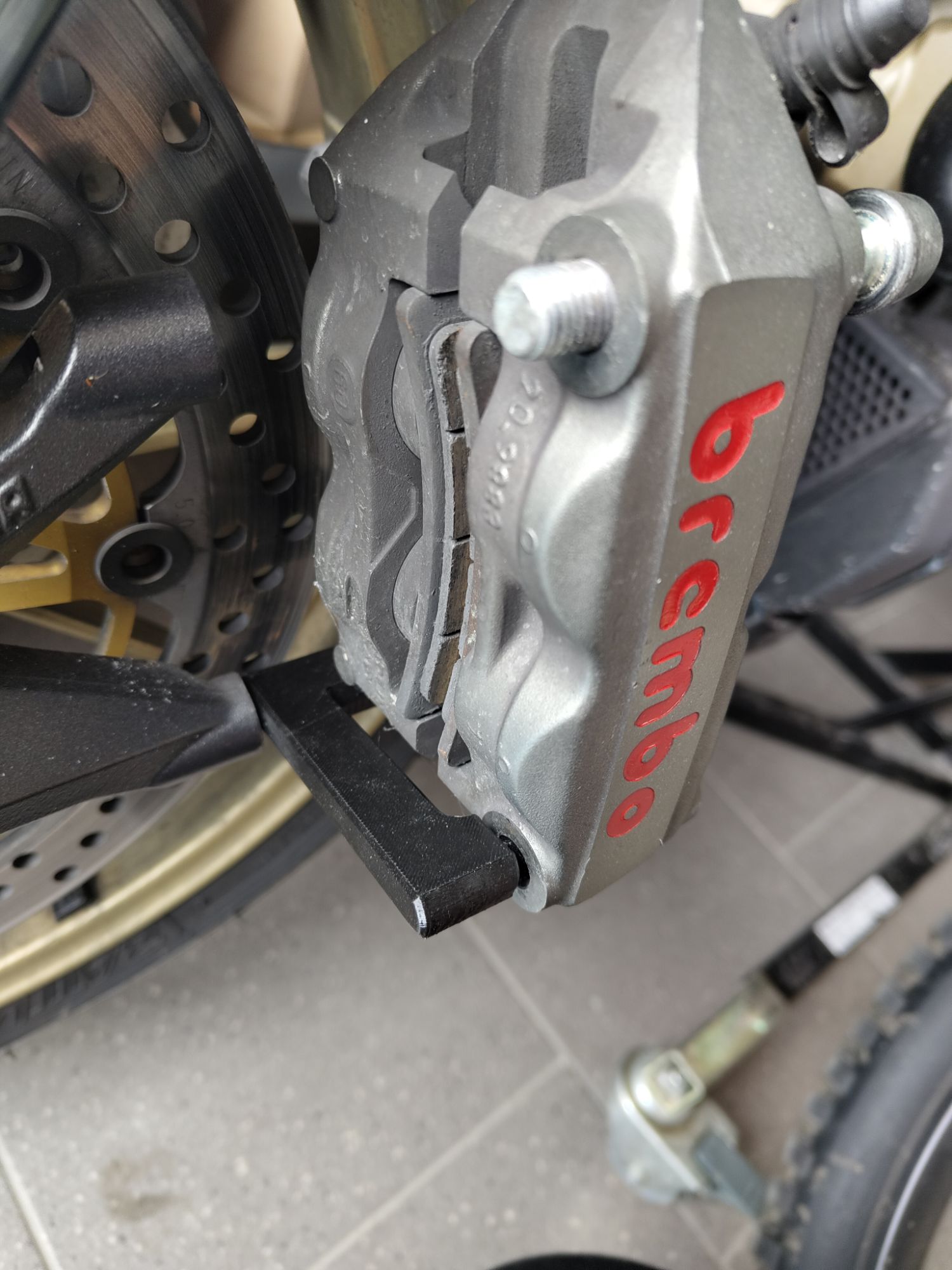 Bremssattelhalter für Montagearbeiten